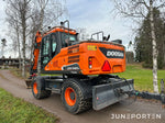 Hjulgrävare Doosan DX140W med dumpervagn