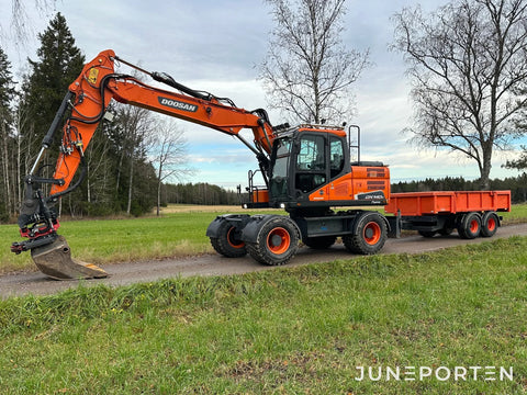 Hjulgrävare Doosan DX140W med dumpervagn