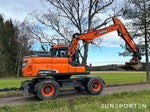 Hjulgrävare Doosan DX140W med dumpervagn