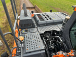 Hjulgrävare Doosan DX140W med dumpervagn