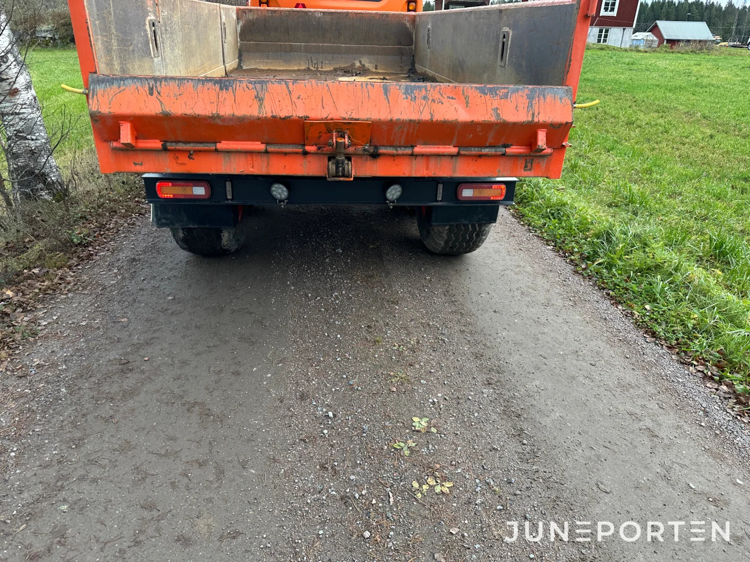 Hjulgrävare Doosan DX140W med dumpervagn