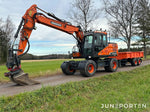 Hjulgrävare Doosan DX140W med dumpervagn