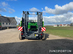 Fyrkantspress John Deere L1524H med vagn