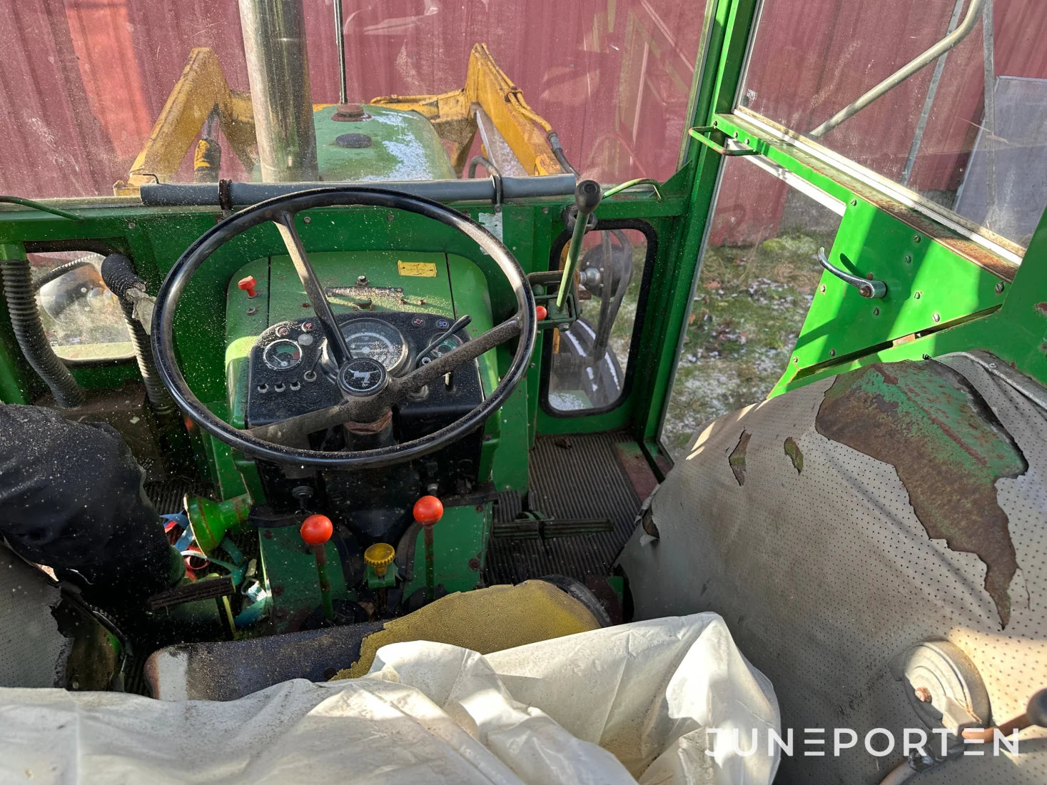 John Deere 1130 med lastare