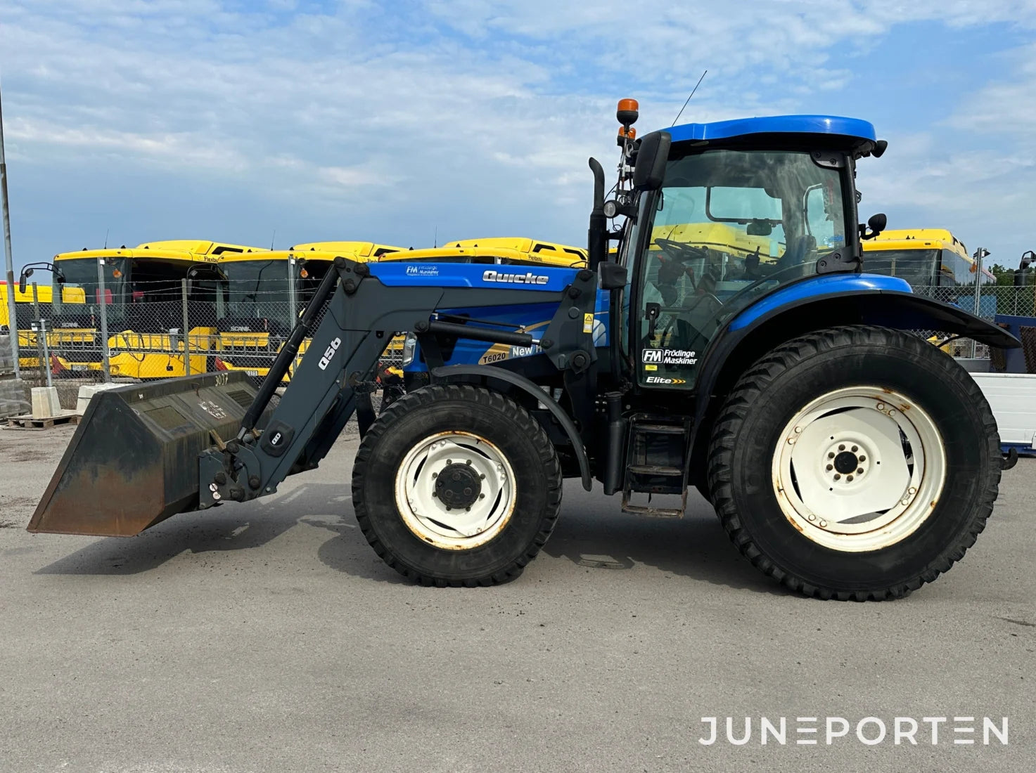 New Holland T 6020 med lastare & frontlyft