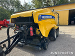 Rundbalspress New Holland 135