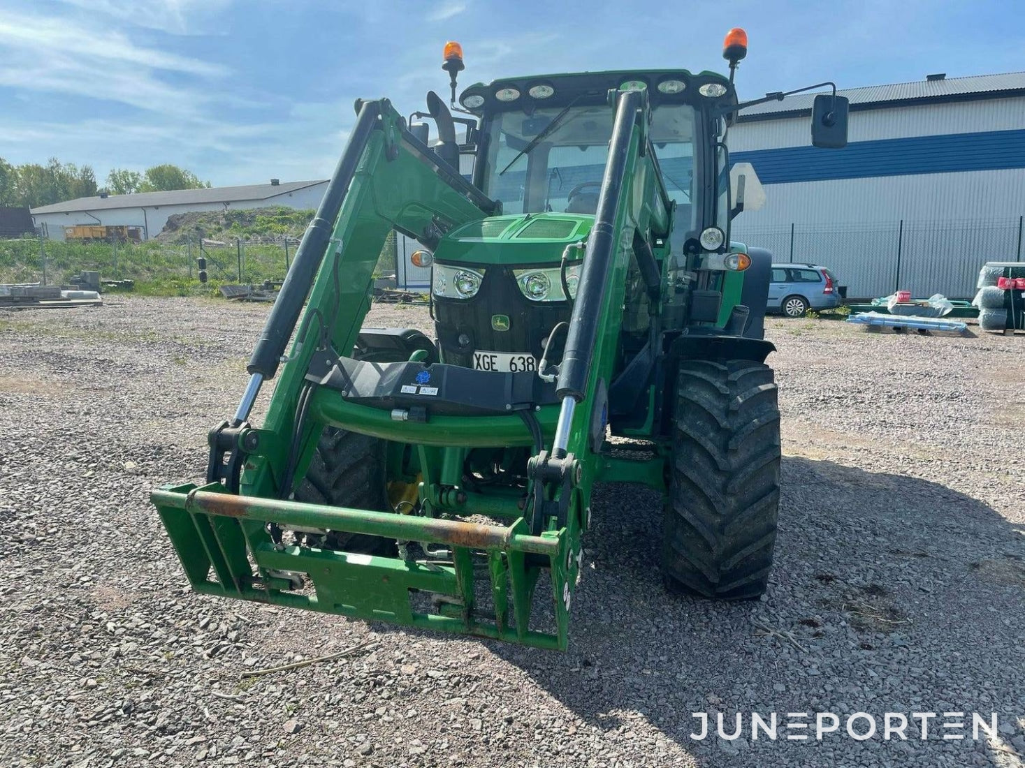 John Deere 6115R med lastare