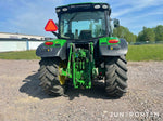 John Deere 6115R med lastare