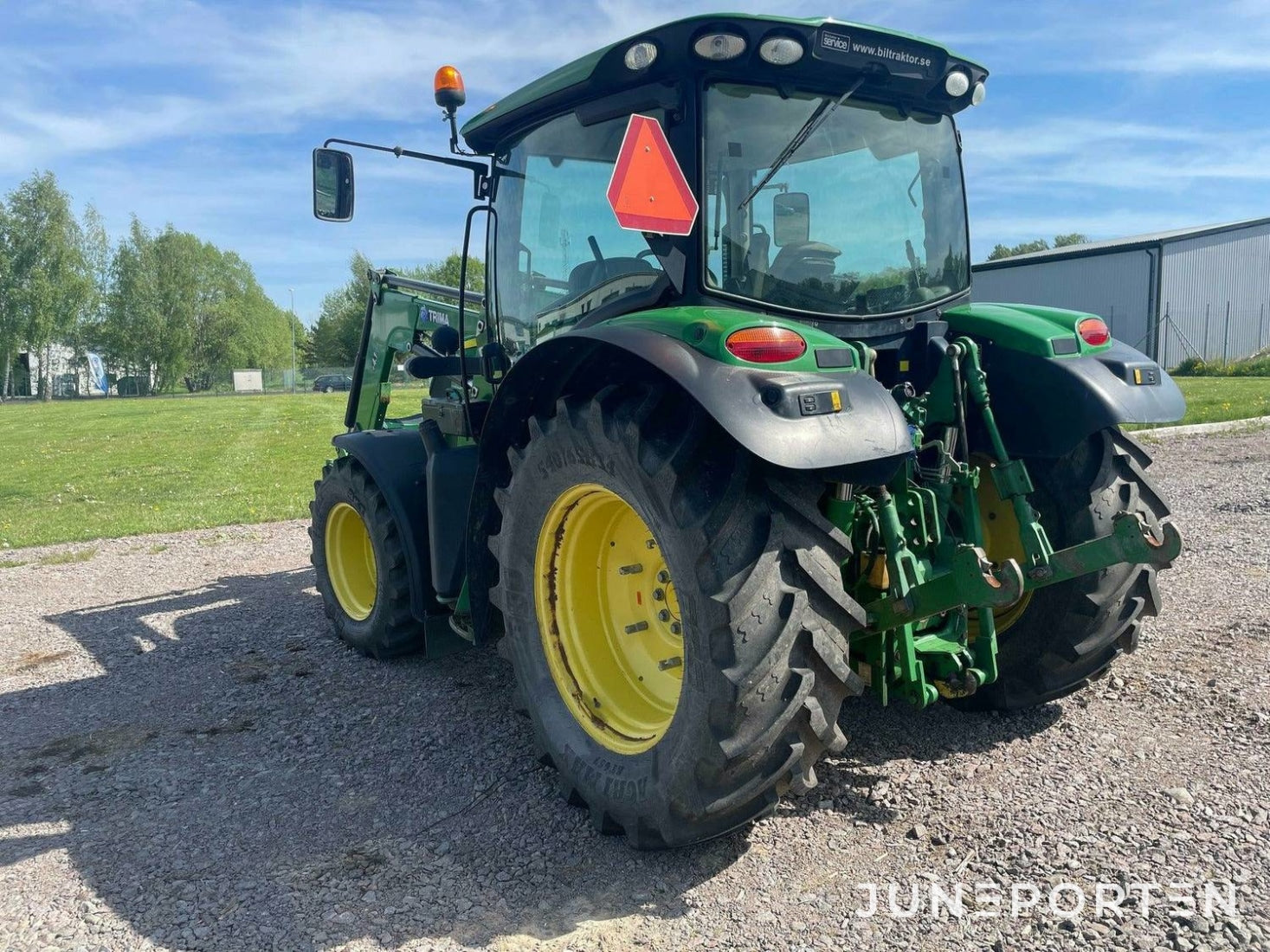 John Deere 6115R med lastare