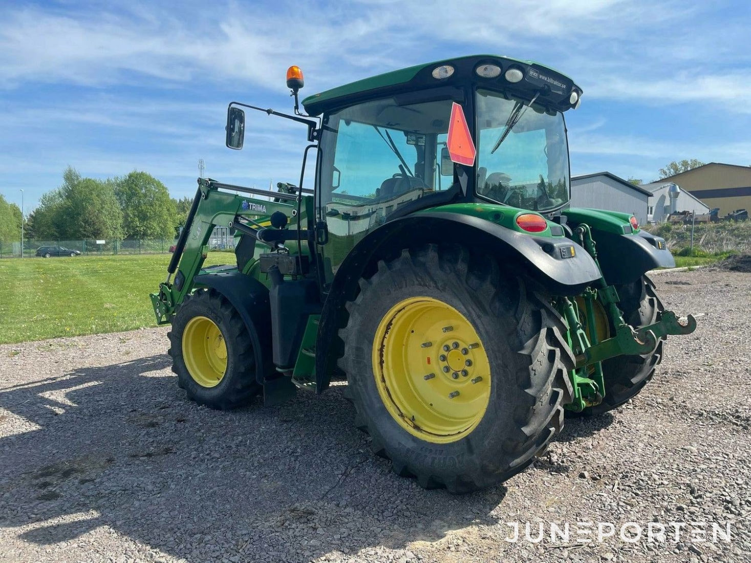 John Deere 6115R med lastare