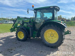 John Deere 6115R med lastare