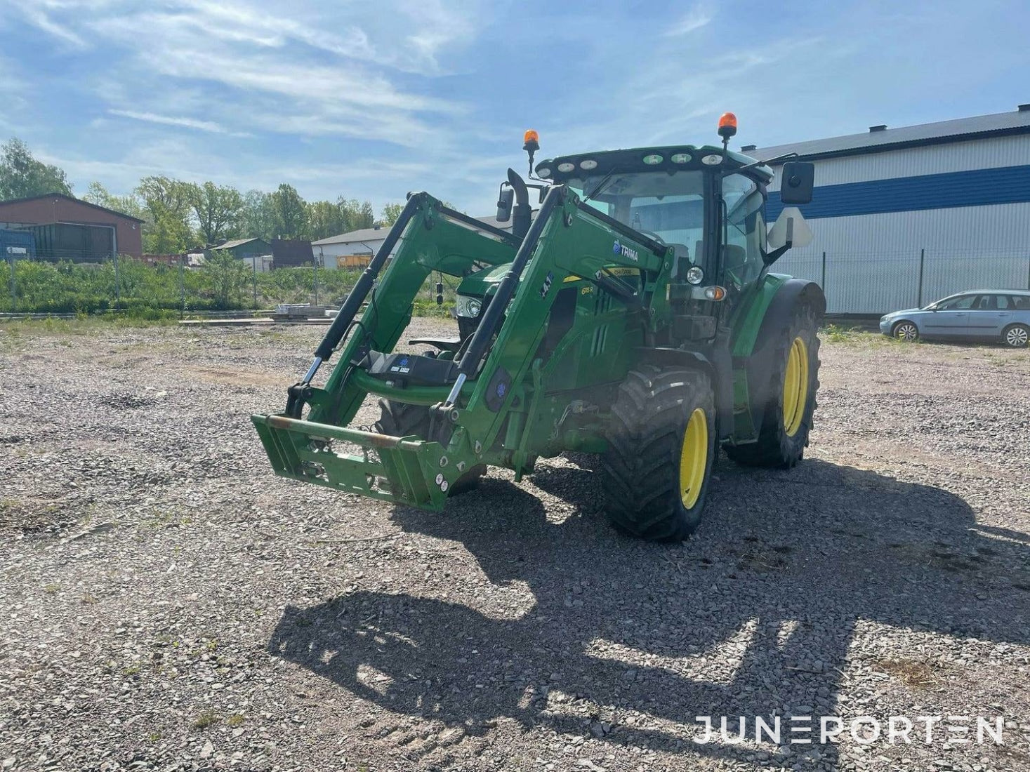 John Deere 6115R med lastare