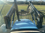 New Holland TS 100 med Lastare