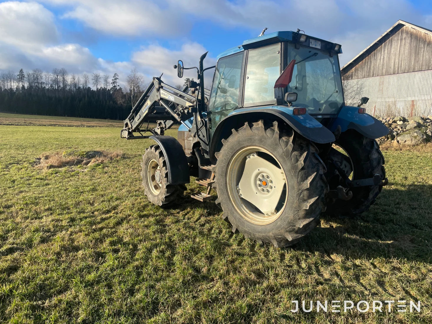 New Holland TS 100 med Lastare