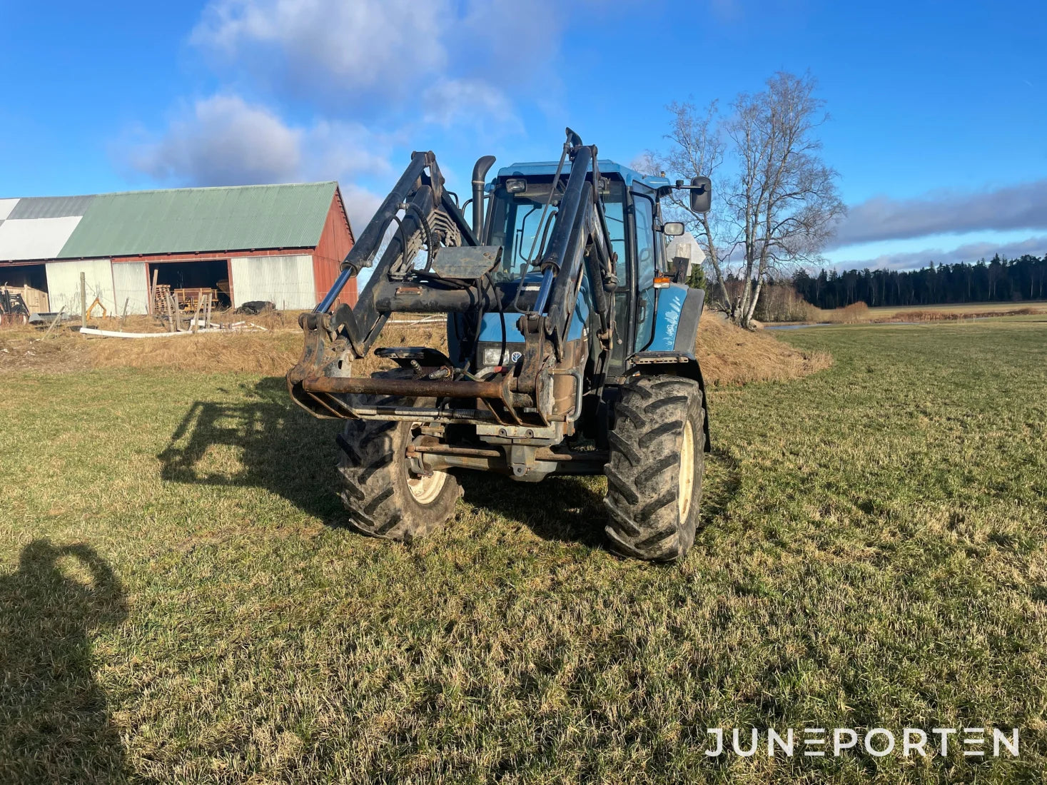 New Holland TS 100 med Lastare